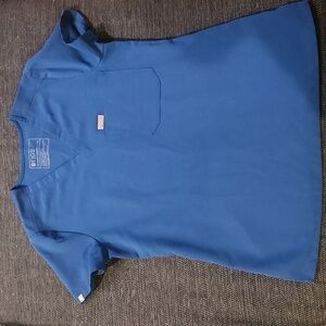 Figs scrub set in Livingston Size XS pants are XS petite.